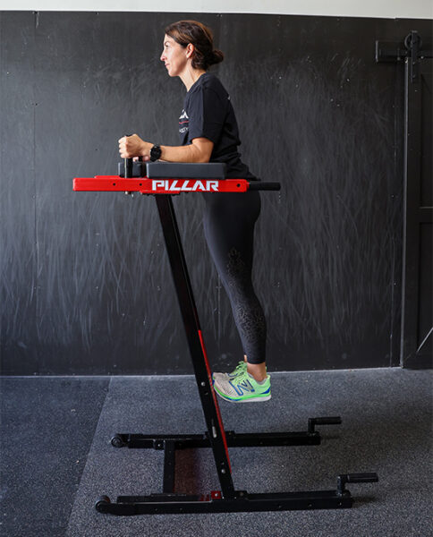 Person using Pillar Vertical Plank System